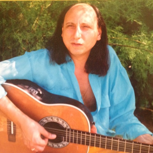 Sous le soleil avec sa guitare